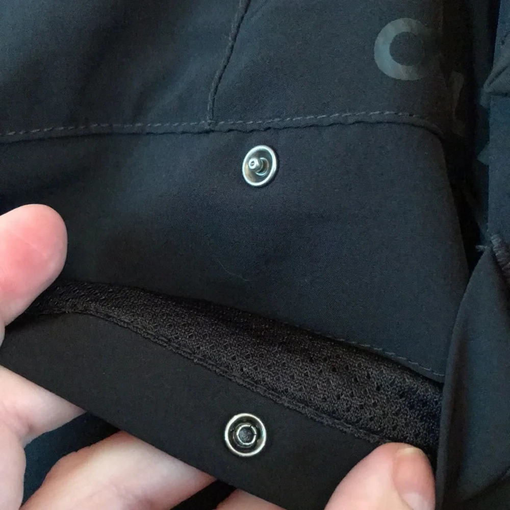 Oakley size 40 black stretch nylon 9.5” hybrid cargo board shorts swim water EUC